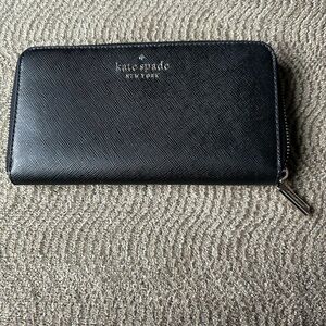 Kate Spade New York black zip-around continental wallet